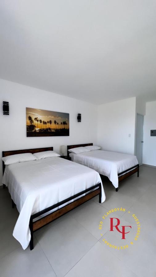 Red Flamboyan Guesthouse And Restaurant Rincon Bagian luar foto