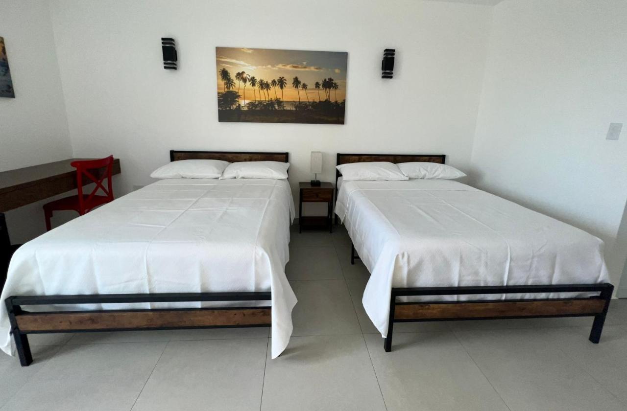 Red Flamboyan Guesthouse And Restaurant Rincon Bagian luar foto