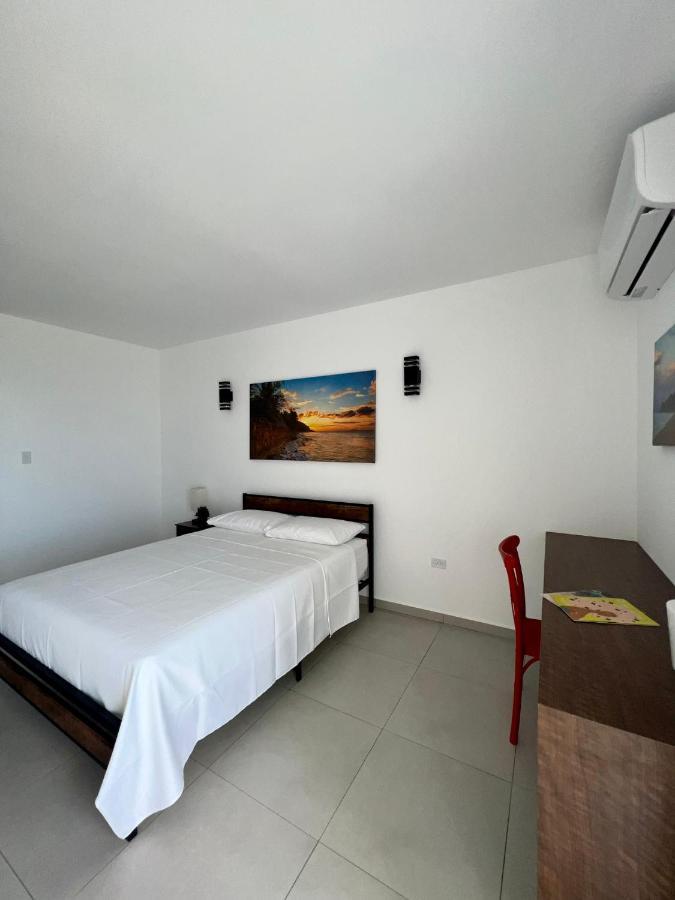 Red Flamboyan Guesthouse And Restaurant Rincon Bagian luar foto